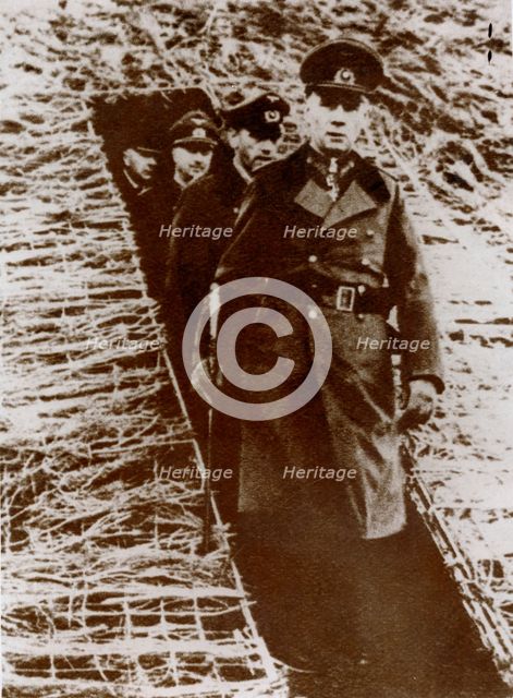 Field Marshal Erwin Rommel inspecting a dugout on the Channel coast, France, World War II, 1944 Creator: Unknown.