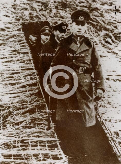 Field Marshal Erwin Rommel inspecting a dugout on the Channel coast, France, World War II, 1944 Artist: Unknown