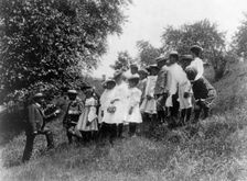 Field-trip - school children outdoors listening to man, DC Public School, 8th Division (?), (1899?). Creator: Frances Benjamin Johnston