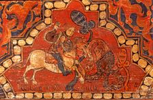 Fight of a knight against a dragon coffered ceiling, detail of a polychromed beam