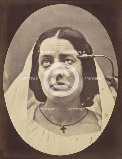 Figure 75: Nun saying her prayers, 1854-56, printed 1862. Creators: Duchenne de Boulogne, Adrien Alban Tournachon.
