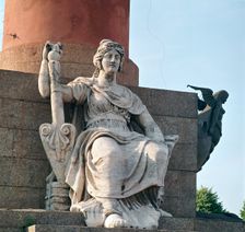 Figure at the base of the Rostral Pillar on Vassilievsky Island