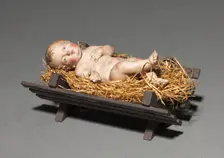 Figure from a Crèche: Infant Christ with Crib and Straw, 1780-1830. Creator: Unknown