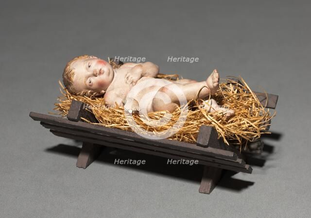 Figure from a Crèche: Infant Christ with Crib and Straw, 1780-1830. Creator: Unknown.