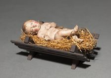 Figure from a Crèche: Infant Christ with Crib and Straw, 1780-1830. Creator: Unknown