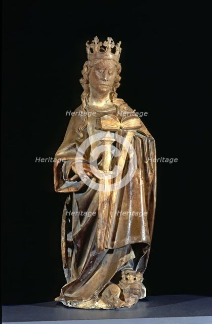 Figure holding the book that contains the epitaph, sculpture from the tomb of Bishop Bernat de Pa…