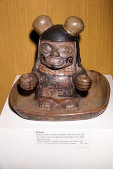 Figure with knobbed headdress and robe, Pacheco Culture, Tiahuanaco, Peru, 600-1000