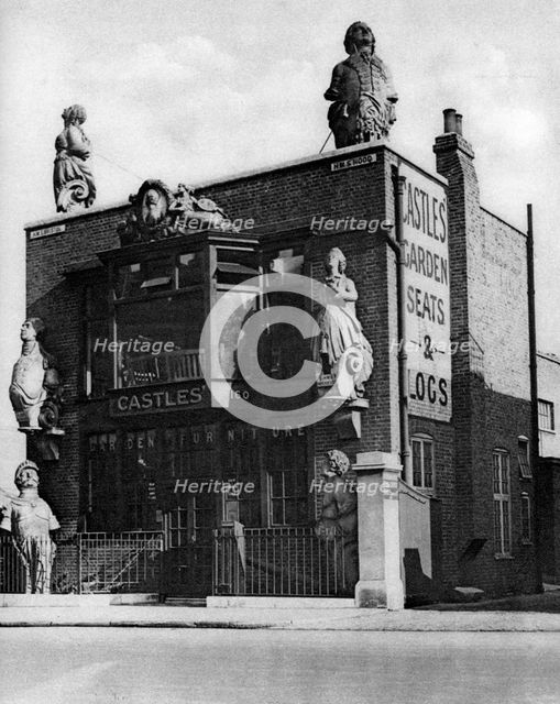 Figureheads of old fighting ships, Grosvenor Road, London, 1926-1927.Artist: Whiffin