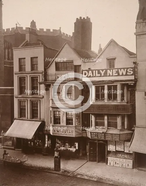 Figures standing near a shop front on Macclesfield Street, Soho, London, 1883. Artist: Henry Dixon