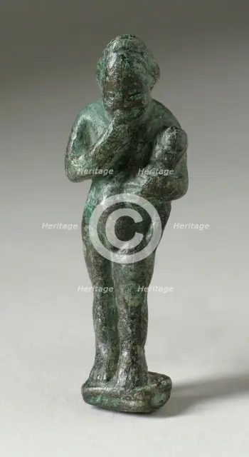 Figurine of a Standing Naked Man Holding a Baby, Ptolemaic Period-early Roman Period 200 BCE-100 CE. Creator: Unknown.