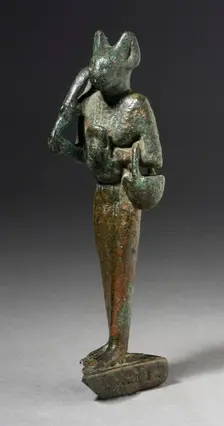 Figurine of Standing Cat Headed Goddess with Sistrum, Probably Ptolemaic Period (332-30 BCE). Creator: Unknown