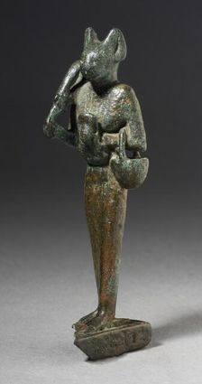 Figurine of Standing Cat Headed Goddess with Sistrum, Probably Ptolemaic Period (332-30 BCE). Creator: Unknown