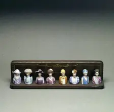 Figurines depicting lady golfers, early 20th century. Creator: Unknown