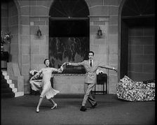 Film Actor Walter John Jack Buchanan Dancing with Miss June (June Knight) in a Production..., 1920 Creator: British Pathe Ltd