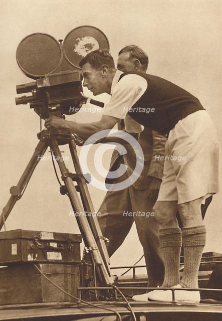 'Film-maker - Making a cinema record at one of his annual camps for boys', 1927 (1937). Artist: Unknown.
