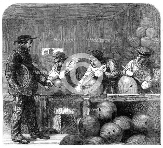 Finishing shells at Woolwich Arsenal, 1862. Creator: W Thomas.