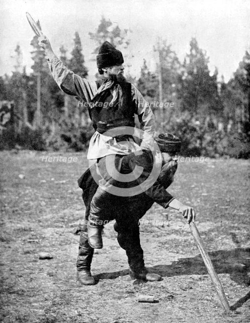 Finns playing Kykka, the national game, 1936. Artist: ENA