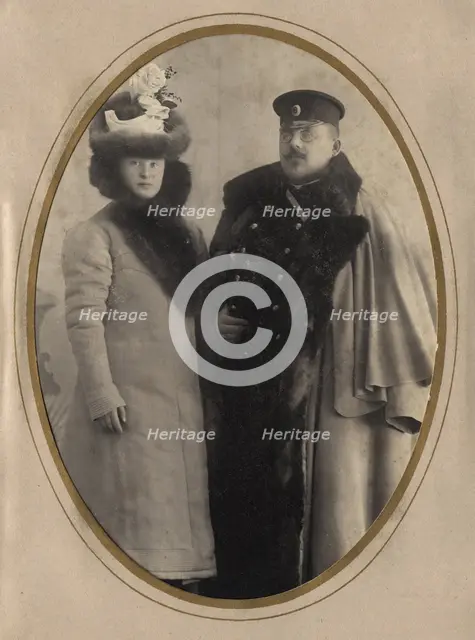 Fire Chief A. F. Domishkevich in the Winter Uniform of a Firefighter (With His Wife), 1901. Creator: N. A. Lavrov.