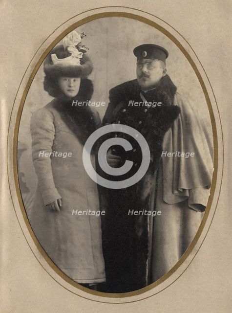 Fire Chief A. F. Domishkevich in the Winter Uniform of a Firefighter (With His Wife), 1901. Creator: N. A. Lavrov.