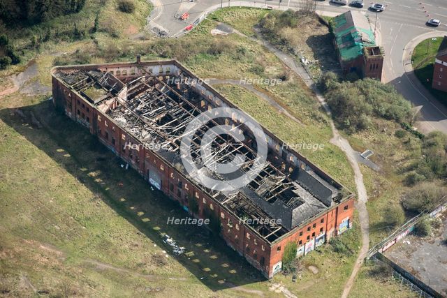 Fire damaged warehouse at Friar Gate Goods Yard, City of Derby, 2021. Creator: Damian Grady.