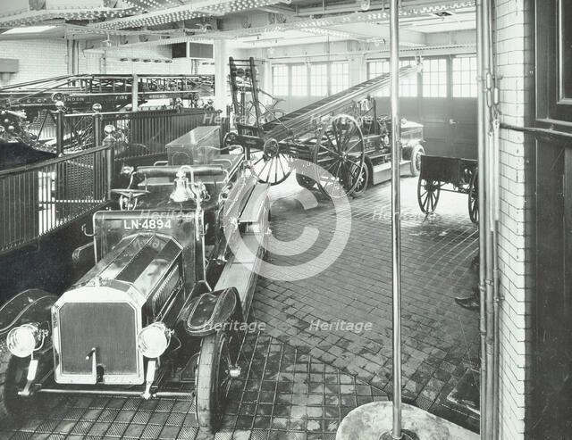Fire engines and equipment at Cannon Street Fire Station, City of London, 1913. Artist: Unknown.