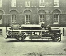 Firemen aboard a foam tender, London Fire Brigade Headquarters, London, 1929