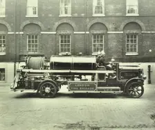 Firemen aboard a foam tender, London Fire Brigade Headquarters, London, 1929