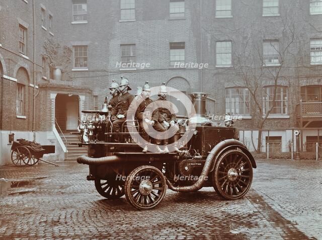 Firemen aboard a motor steamer, London Fire Brigade Headquarters, London, 1909. Artist: Unknown.