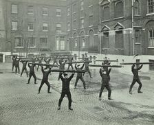 Firemen carrying out scaling ladder drill, London Fire Brigade Headquarters, 1910