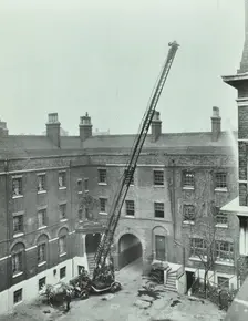 Firemen demonstrating the magirus ladder, London Fire Brigade Headquarters, London, 1910