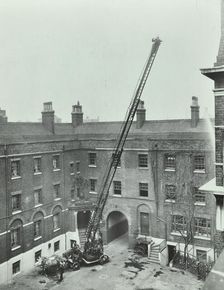 Firemen demonstrating the magirus ladder, London Fire Brigade Headquarters, London, 1910