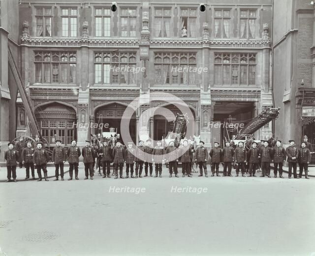 Firemen lined up outside Bishopsgate Fire Station, Bishopsgate, City of London, 1908. Artist: Unknown.