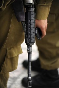 Firearm detail, soldier at the Western Wall, Jerusalem, Israel, 2013. Creator: LTL