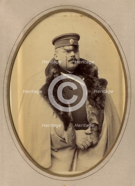 Firefighter A.F. Domishkevich in uniform, late 19th cent - early 20th cent. Creator: PA Milevskii.