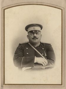 Firefighter A.F. Domishkevich in uniform, late 19th cent - early 20th cent. Creator: Til Serebrin