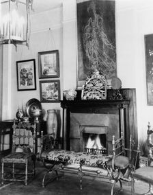 Fireplace, furniture, and works of art in Frances Benjamin Johnston's..., New Orleans, c1920 - 1950. Creator: Frances Benjamin Johnston