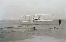 First flight of Wright brothers aircraft, Kitty Hawk, North Carolina, USA, December 17, 1903. Creator: Unknown