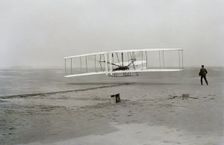 First flight of Wright brothers aircraft, Kitty Hawk, North Carolina, USA, December 17, 1903. Creator: Unknown