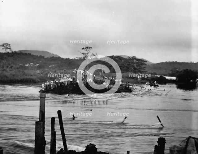 First rush of water through Gamboa dyke, Panama Canal, c.between 1910 and 1914. Creator: Unknown.