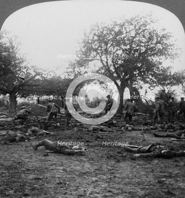 First World War battlefield scene, 1914-1918.Artist: Realistic Travels Publishers