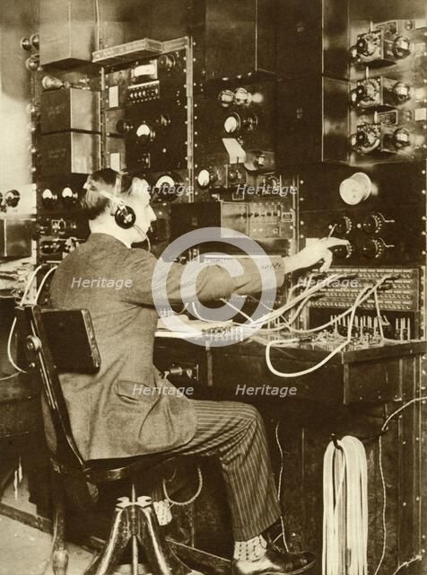 First transatlantic telephone call, from London to New York, 7 March 1926, (1935). Creator: Unknown.