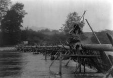 Fish-weir across Trinity River-Hupa, 1923. Creator: Edward Sheriff Curtis