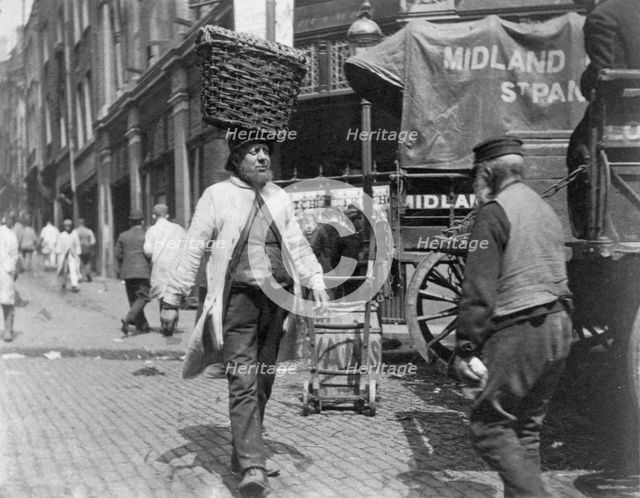 Fish porters at Billingsgate Market, London, 1893.  Creator: Paul Martin.