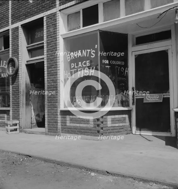 Fish restaurant for colored in the quarter cotton hoers are recruited, Memphis, Tennessee, 1937. Creator: Dorothea Lange.