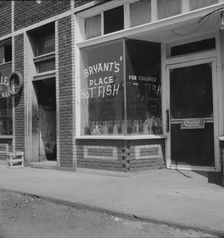 Fish restaurant for colored in the quarter cotton hoers are recruited, Memphis, Tennessee, 1937. Creator: Dorothea Lange