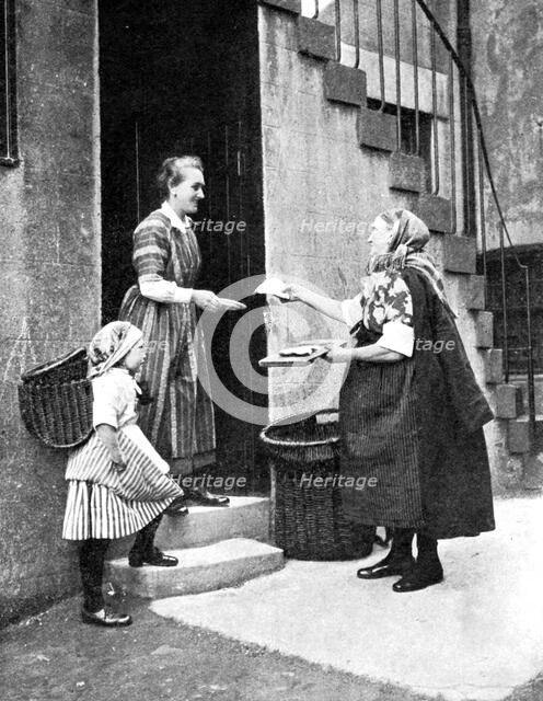 Fish seller, Scotland, 1936. Artist: Donald McLeish