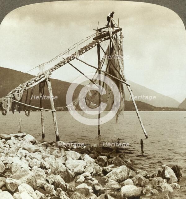 'Fisherman arranging salmon nets at Balestrand on Sognefjord - Balholm in distance, Norway', c1905. Creator: Unknown.