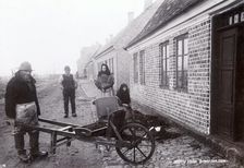 Fisherman with his wheelbarrow, Borstahusen, Landskrona, Sweden, c1900