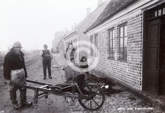 Fisherman with his wheelbarrow, Borstahusen, Landskrona, Sweden, c1900. Artist: Unknown