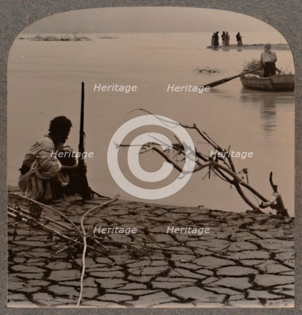 'Fishermen by the Dead Sea: showing cracks on shore', c1900. Artist: Unknown.